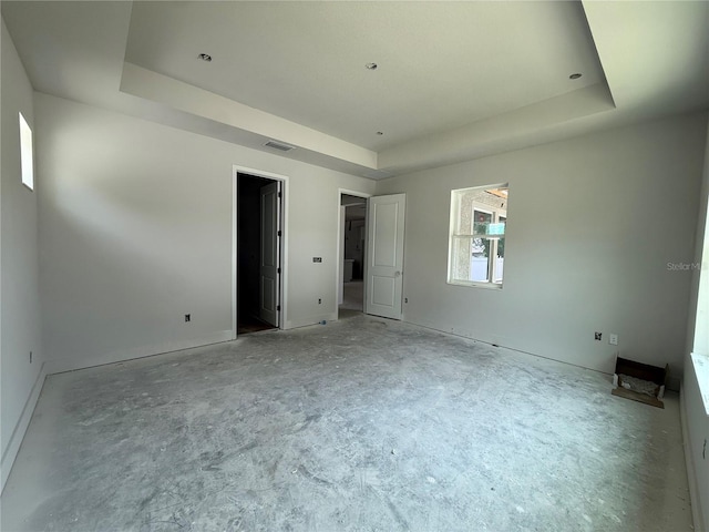 1828 27th Ave N, Saint Petersburg, FL 33713 - unfurnished bedroom with a tray ceiling