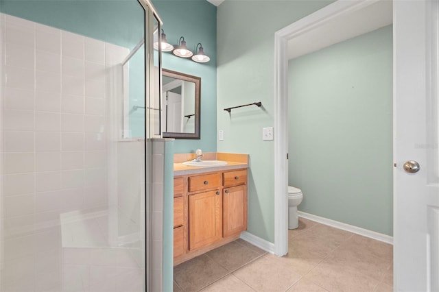 19232 Barred Owl Ct, Land O Lakes, FL 34638 - bathroom featuring vanity, a tile shower, and tile patterned flooring
