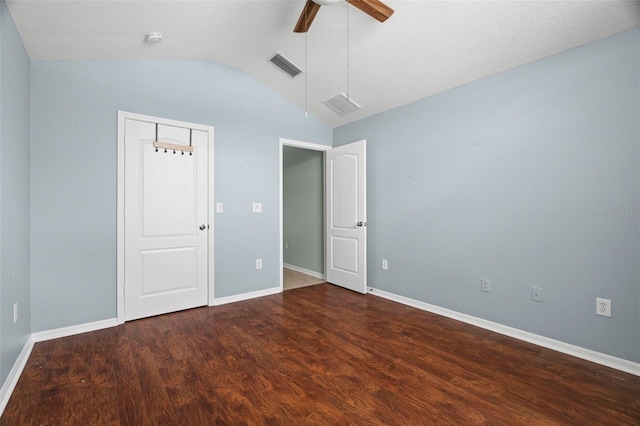 19232 Barred Owl Ct, Land O Lakes, FL 34638 - unfurnished bedroom featuring wood finished floors, vaulted ceiling, and a ceiling fan