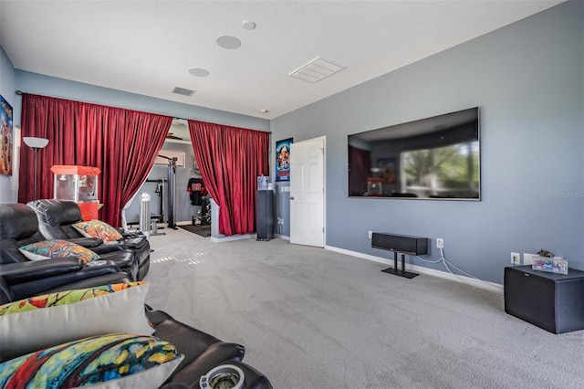 living area featuring carpet, visible vents, and baseboards