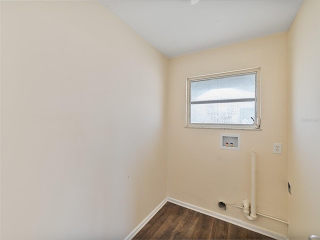 laundry area with dark wood-type flooring, baseboards, hookup for a washing machine, and laundry area