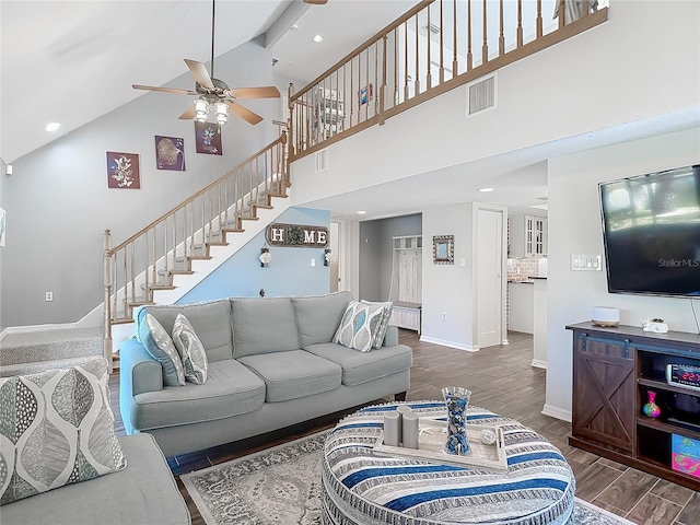 3611 Pine Knot Dr, Valrico, FL 33596 - living room featuring stairway, visible vents, baseboards, wood finished floors, and a ceiling fan