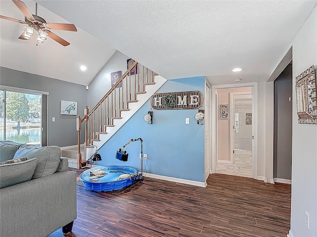 3611 Pine Knot Dr, Valrico, FL 33596 - stairway featuring ceiling fan, baseboards, recessed lighting, vaulted ceiling, and wood finished floors