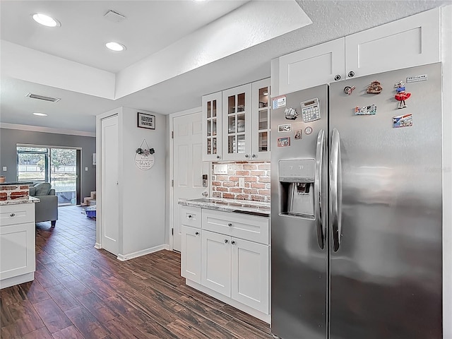 3611 Pine Knot Dr, Valrico, FL 33596 - kitchen featuring glass insert cabinets, stainless steel fridge, dark wood-type flooring, baseboards, and white cabinets