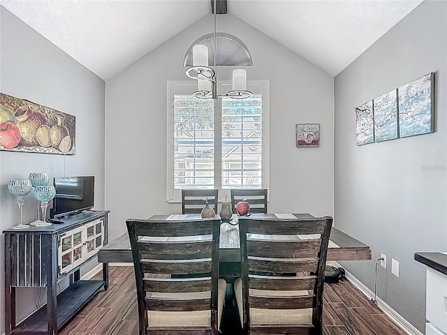 3611 Pine Knot Dr, Valrico, FL 33596 - dining area with a chandelier, baseboards, wood finished floors, and vaulted ceiling