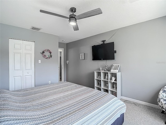 3611 Pine Knot Dr, Valrico, FL 33596 - bedroom with carpet flooring, a closet, a ceiling fan, visible vents, and baseboards