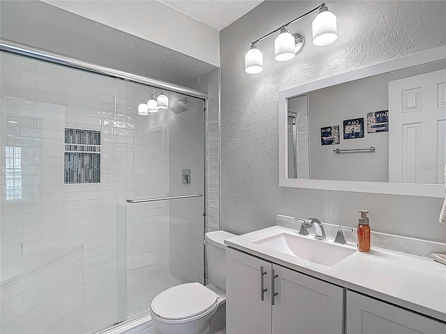 3611 Pine Knot Dr, Valrico, FL 33596 - full bath featuring toilet, a textured wall, vanity, a stall shower, and a textured ceiling