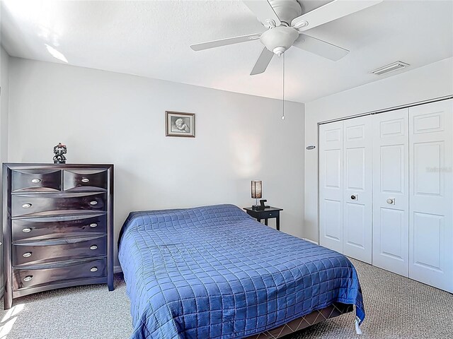 3611 Pine Knot Dr, Valrico, FL 33596 - bedroom with a closet, carpet flooring, ceiling fan, and visible vents