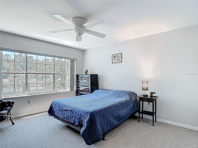 3611 Pine Knot Dr, Valrico, FL 33596 - carpeted bedroom with baseboards and ceiling fan