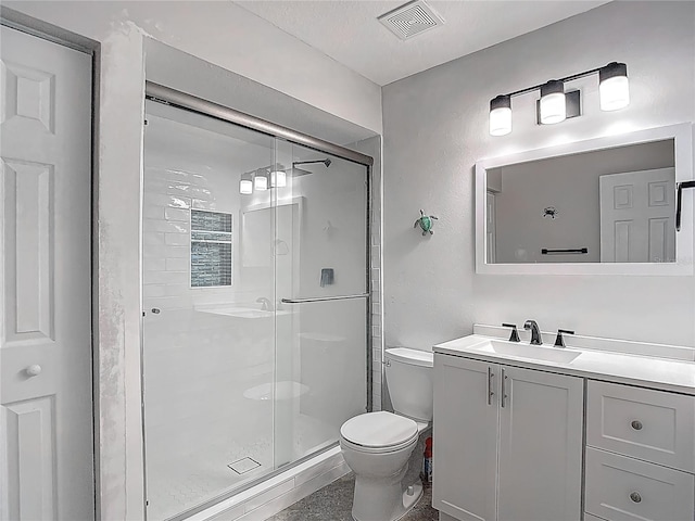 3611 Pine Knot Dr, Valrico, FL 33596 - full bathroom featuring visible vents, a stall shower, toilet, and vanity