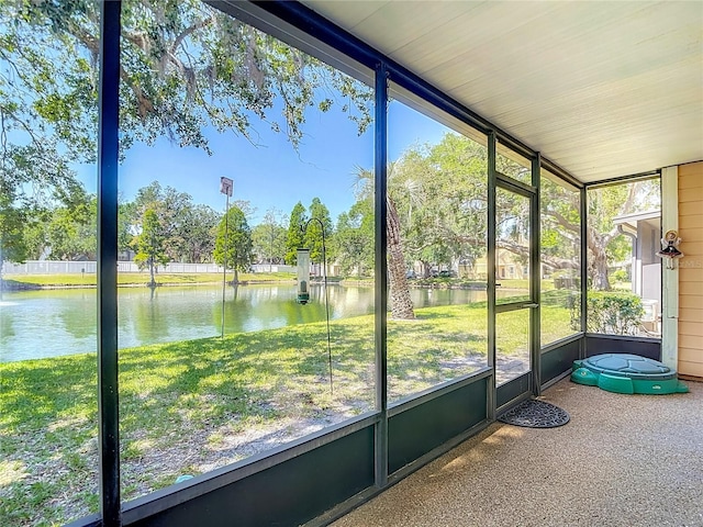 3611 Pine Knot Dr, Valrico, FL 33596 - unfurnished sunroom featuring a wealth of natural light and a water view