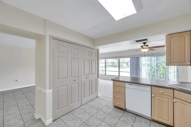 1655 S Highland Ave Unit D140, Clearwater, FL 33756 - kitchen featuring dishwasher, light brown cabinets, and light tile patterned floors