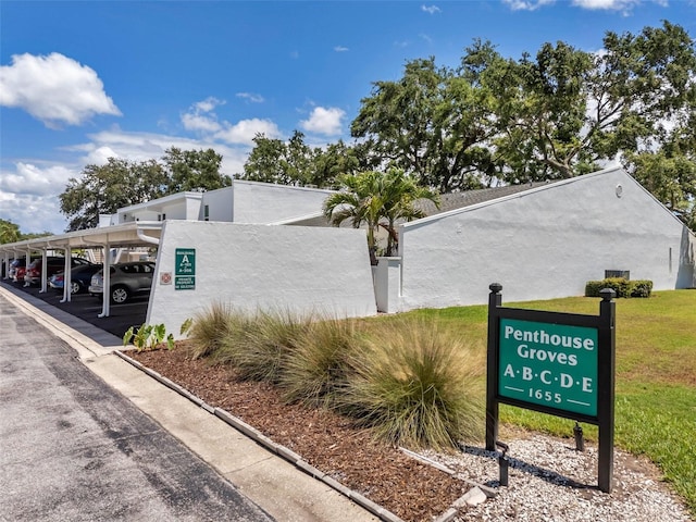 1655 S Highland Ave Unit D140, Clearwater, FL 33756 - exterior space featuring parking