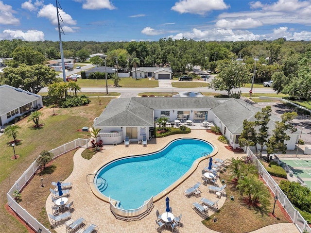 1655 S Highland Ave Unit D140, Clearwater, FL 33756 - community pool featuring a fenced backyard and a patio