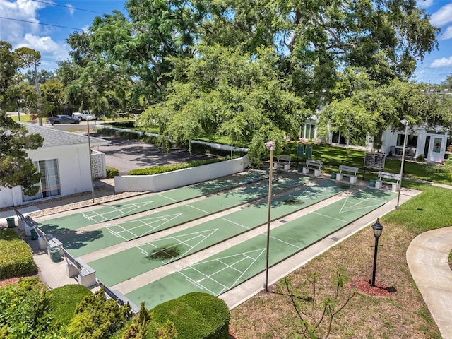 1655 S Highland Ave Unit D140, Clearwater, FL 33756 - view of community featuring shuffleboard and view of scattered trees