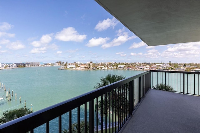 balcony featuring a water view