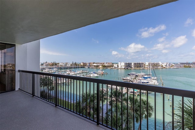 balcony featuring a water view