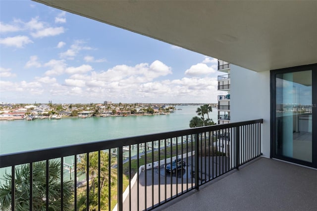 balcony featuring a water view