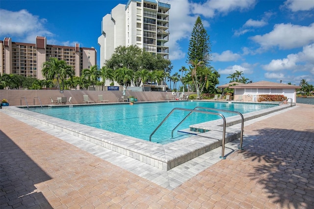 pool featuring a patio area