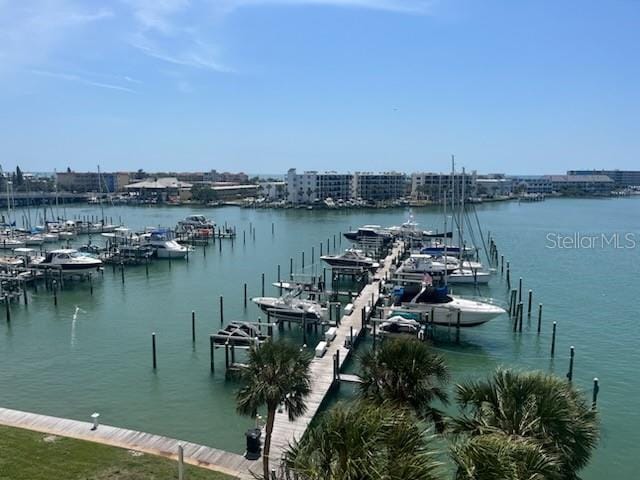property view of water featuring a boat dock and boat lift