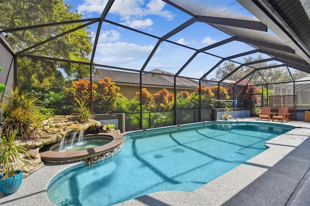 view of swimming pool featuring a patio and a pool with connected hot tub