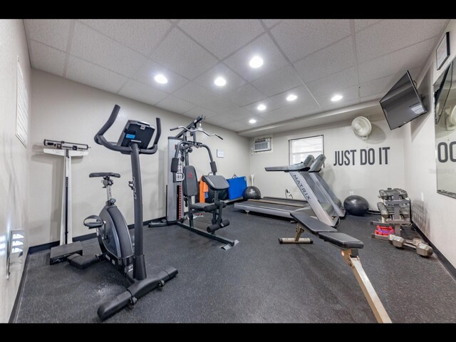 1430 Gulf Blvd Unit 102, Clearwater Beach, FL 33767 - exercise area with recessed lighting, a paneled ceiling, and a wall unit AC