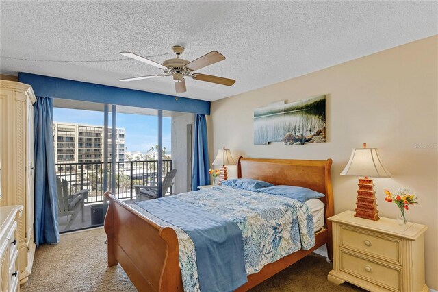 1460 Gulf Blvd Unit 406, Clearwater Beach, FL 33767 - bedroom with access to exterior, light colored carpet, a ceiling fan, and a textured ceiling