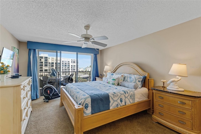 1460 Gulf Blvd Unit 406, Clearwater Beach, FL 33767 - bedroom featuring light carpet, access to outside, a textured ceiling, and ceiling fan