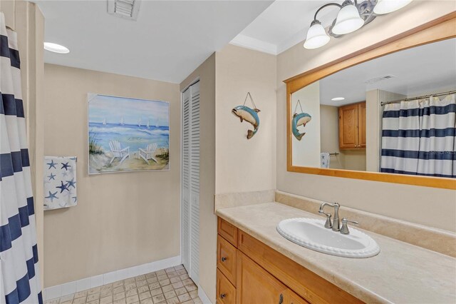 1460 Gulf Blvd Unit 406, Clearwater Beach, FL 33767 - full bathroom featuring vanity, visible vents, baseboards, and a shower with curtain