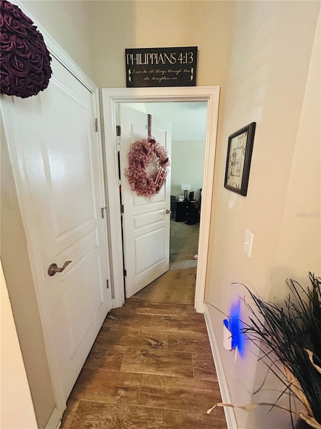hall featuring wood finished floors