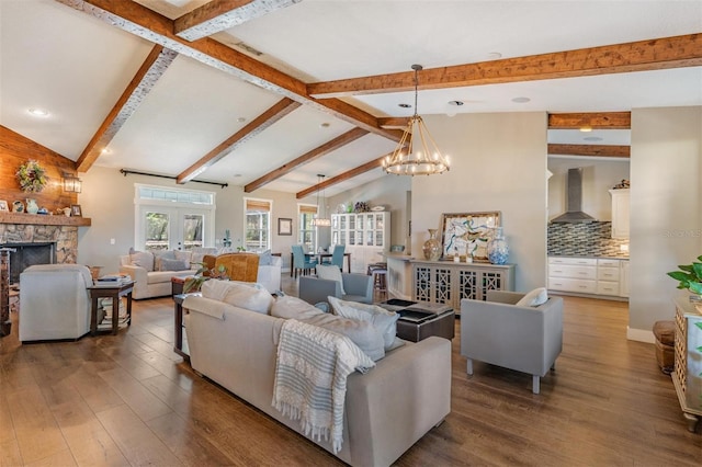25601 Hutcheson Ln, Sorrento, FL 32776 - living room featuring beamed ceiling, an inviting chandelier, recessed lighting, a fireplace, and wood finished floors