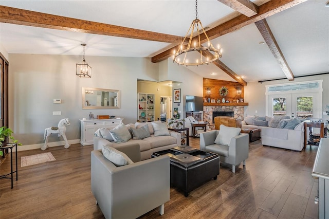 25601 Hutcheson Ln, Sorrento, FL 32776 - living room with a chandelier, lofted ceiling with beams, dark wood-type flooring, a stone fireplace, and baseboards