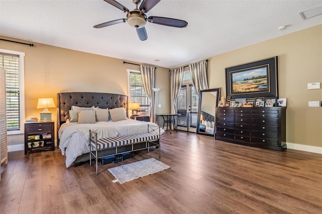 25601 Hutcheson Ln, Sorrento, FL 32776 - bedroom featuring wood finished floors, ceiling fan, baseboards, visible vents, and a textured ceiling