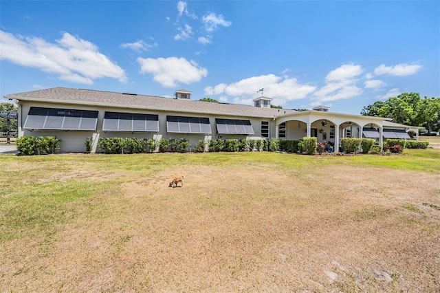 25601 Hutcheson Ln, Sorrento, FL 32776 - rear view of property with a yard