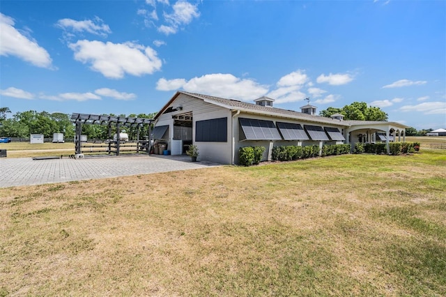 25601 Hutcheson Ln, Sorrento, FL 32776 - view of side of property with a yard and a pergola
