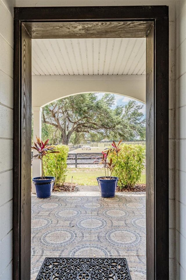 25601 Hutcheson Ln, Sorrento, FL 32776 - entryway with plenty of natural light
