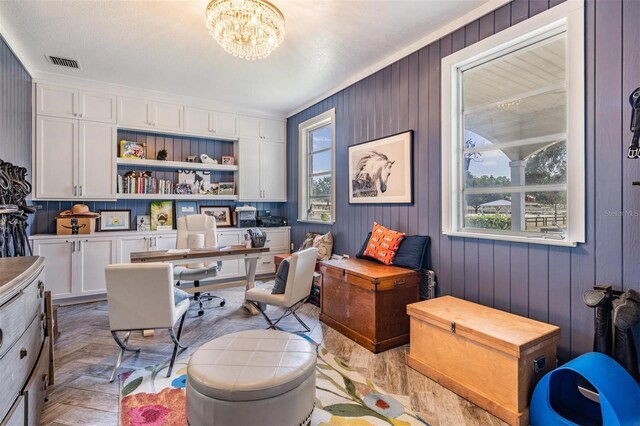 25601 Hutcheson Ln, Sorrento, FL 32776 - office with a notable chandelier, visible vents, and wood walls