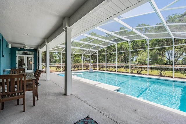 25601 Hutcheson Ln, Sorrento, FL 32776 - outdoor pool with ceiling fan, a patio area, french doors, and glass enclosure