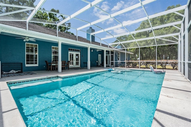 25601 Hutcheson Ln, Sorrento, FL 32776 - outdoor pool with a patio, a ceiling fan, french doors, and a lanai