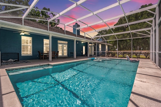 25601 Hutcheson Ln, Sorrento, FL 32776 - pool featuring a hot tub, glass enclosure, a patio area, french doors, and a ceiling fan