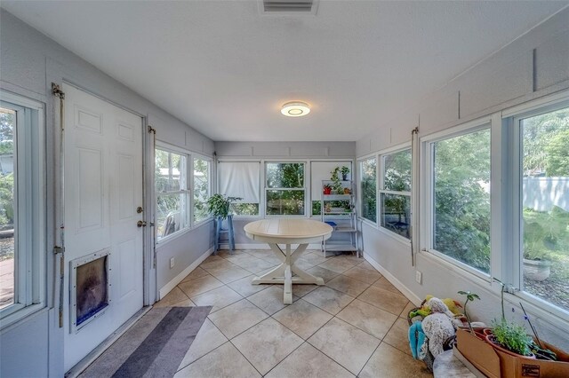sunroom featuring visible vents