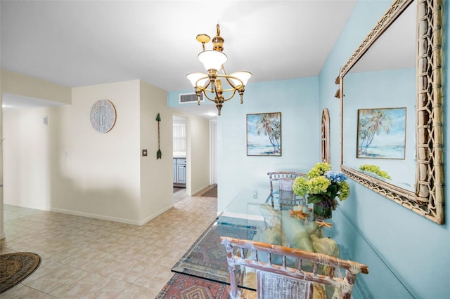 5108 Brittany Dr S Unit 607, Saint Petersburg, FL 33715 - hallway featuring a chandelier