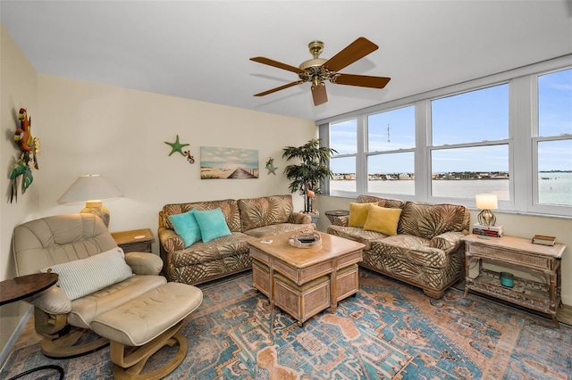 5108 Brittany Dr S Unit 607, Saint Petersburg, FL 33715 - living area with ceiling fan and a water view