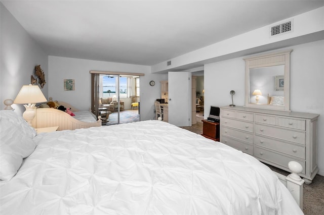 5108 Brittany Dr S Unit 607, Saint Petersburg, FL 33715 - carpeted bedroom featuring access to exterior