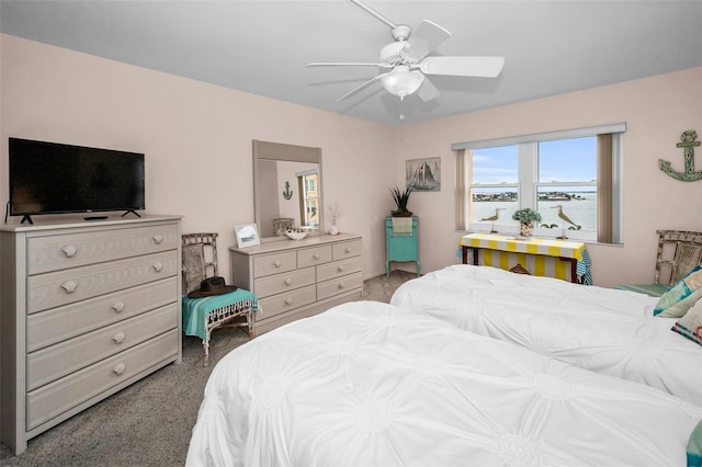 5108 Brittany Dr S Unit 607, Saint Petersburg, FL 33715 - bedroom featuring carpet, a water view, and ceiling fan