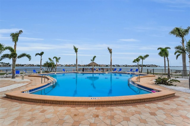 5108 Brittany Dr S Unit 607, Saint Petersburg, FL 33715 - community pool featuring fence and a patio