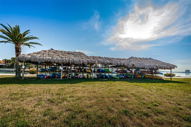 5108 Brittany Dr S Unit 607, Saint Petersburg, FL 33715 - view of grassy yard featuring a water view