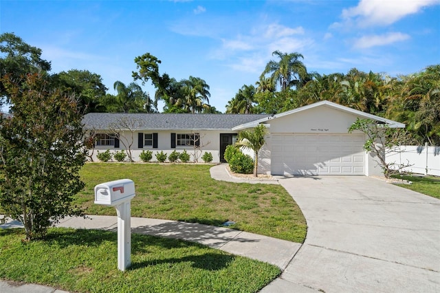 1698 Eden Ct, Clearwater, FL 33756 - ranch-style house with stucco siding, an attached garage, driveway, and a front yard