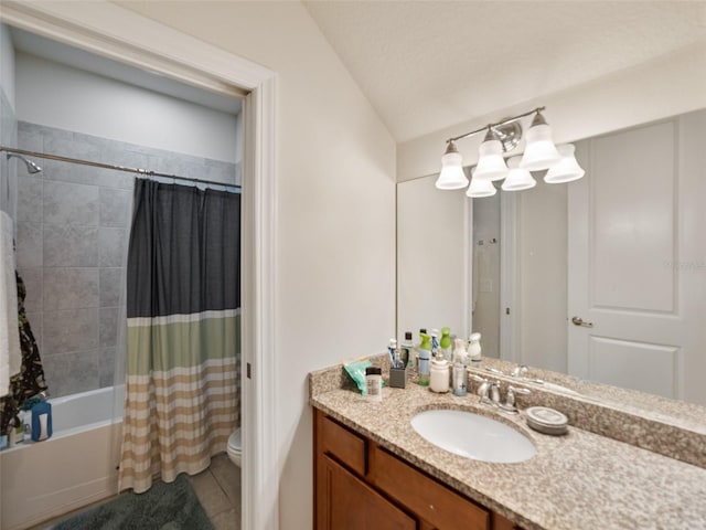 full bathroom featuring shower / tub combo, vanity, a notable chandelier, tile patterned flooring, and toilet