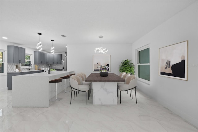 4175 N Concord Dr, Crystal River, FL 34428 - dining area featuring baseboards, an inviting chandelier, recessed lighting, visible vents, and marble finish floor